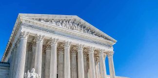 Trump Scores Win — SCOTUS RULES Supreme Court building with tall marble columns under a clear blue sky