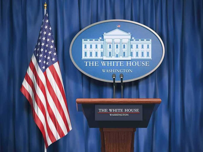 shutterstock_1175844628 White House press briefing podium and US flag