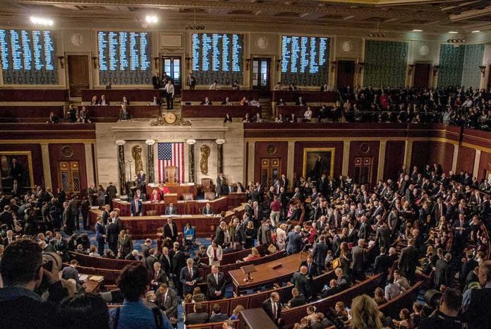shutterstock_1186368289 House chamber filled with lawmakers and staff