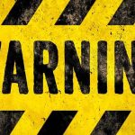 Khamenei’s NEW Warning Jolts Gulf warning sign with yellow and black hazard stripes