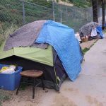 RESIDENTS Hire Ex-Gang Patrols to CLEAN UP Homelessness — WHAT?? Tent encampment along a city sidewalk