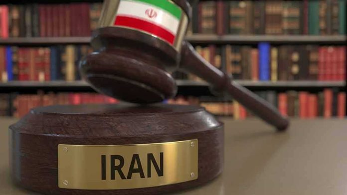 shutterstock_1490284049 Judge's gavel with Iran label in law library