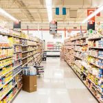 What Trickflation REALLY Is A grocery store aisle filled with various food products on shelves