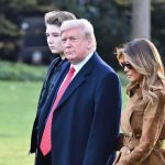 CHILLING — Iran Bounty Targets BARRON TRUMP three people walking outdoors