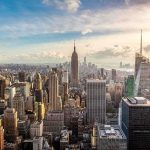 MAMDANI Ducks Grilling — AVOIDS The Tough STUFF! Aerial view of New York City skyline featuring the Empire State Building at sunset