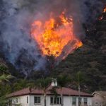 Mayor Jailed For ARSON! Wildfire burning on a hillside near homes