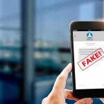IMPOSTER Reaches PM — Secrets LEAKED? Hands holding smartphone showing scam text marked fake