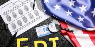 FBI Softens BAN On Prostitution FBI letters with fingerprint sheet, badge, magnifying glass, and US flag