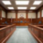 Judge OUSTED — Now What EXPLODES? Empty courtroom with wooden benches and judge's bench