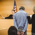 Courthouse ESCAPE Ends In 30-To-Life Defendant in handcuffs stands before a judge in a courtroom