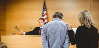 Courthouse ESCAPE Ends In 30-To-Life Defendant in handcuffs stands before a judge in a courtroom