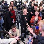 Beloved Star GONE At 36 A crowded press conference with journalists and cameras surrounding a speaker