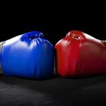 Red STRONGHOLD Suddenly Looks Shaky Blue and red boxing gloves touching together