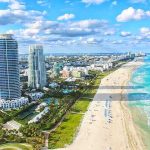 Kids Hit On BEACH Holiday — What REALLY HAPPENED??! Beachfront skyline with high-rise buildings and turquoise ocean