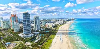 Kids Hit On BEACH Holiday — What REALLY HAPPENED??! Beachfront skyline with high-rise buildings and turquoise ocean