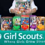 Girl Scouts EARN Badges For ISLAM PRAYER! Girl Scout displays assorted cookie boxes on a table