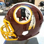Redskins Gear RETURNS — Legal LOOPHOLE? maroon football helmet with yellow facemask on display