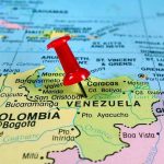 US BRINGS DOWN Cartel Boss — EVIDENCE Goes Missing Red pin on Venezuela, South America map.