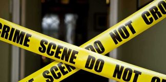 Custody Fight Turned Deadly — Why THIS Little Girl Paid The PRICE Yellow crime scene tape crossing a doorway