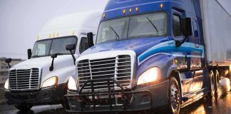 A Trucker Got Stopped For SPEEDING — Then The COP Ran His NAME Two semi trucks driving side by side on a wet highway
