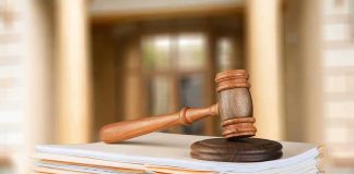 They Heard 43 Witnesses — And Charged NO ONE judge's gavel resting on a stack of case files