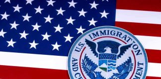 JUST IN — Stolen SSNs Tied To FALSE PAYCHECKS U.S. immigration and customs enforcement seal on American flag