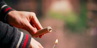 The Fireworks Video Is ONLY HALF The Story Hands lighting a firework fuse with a match