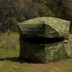 A Hunter Fired At Movement In A Field — It Wasn’t A DEER camouflage hunting blind in a grassy woodland