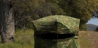 A Hunter Fired At Movement In A Field — It Wasn’t A DEER camouflage hunting blind in a grassy woodland
