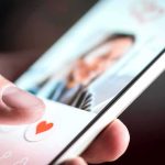 A Model Got Engaged To A Billionaire — Then Police Read Her PHONE hand using a dating app on a smartphone