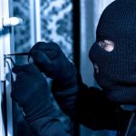 Singer Said A Burglar Shot His Wife — Then Came His TEXTS Masked person picking a door lock