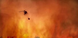 What REALLY Brought The Helicopter Down During Bucket Drop Helicopter fights massive wildfire over burning forest
