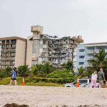 Mid-Air Horror — AMERICAN SINGER DEAD Partially collapsed beachfront condominium building