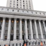 Supreme Court Nukes BAN — 9-0! United States courthouse with grand neoclassical columns