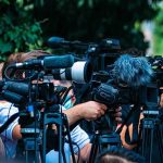 Aaron Rodgers’ STUNNING Steelers Move TV news cameras crowding together at an outdoor event
