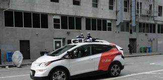 The Car CALLED THE POLICE on its OWN PASSENGERS Autonomous test car with roof sensors on a city street