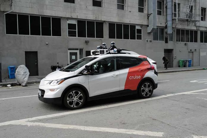 shutterstock_2346072785 Autonomous test car with roof sensors on a city street