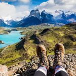 Seven Days MISSING — The Ones Who Found Him Weren’t Even Looking Hiking boots overlooking turquoise lake and jagged mountains
