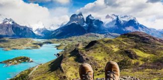 Seven Days MISSING — The Ones Who Found Him Weren’t Even Looking Hiking boots overlooking turquoise lake and jagged mountains