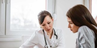 Fifth Circuit FREEZE Upends Abortion Pill Access Doctor consulting a patient at a desk