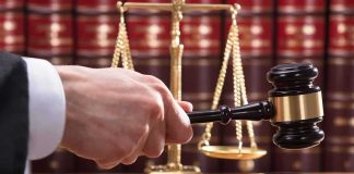 Her RAGE Killed A Dad-To-Be. The Jury Didn’t Wait LONG Judge's hand holding gavel near scales of justice