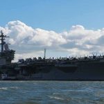 How One Captain’s FATAL Decision Changed Carrier Rules Forever Aircraft carrier at sea with fighter jets on deck