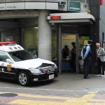 What Hotel CAMERAS Caught Put U.S. Marine In JAIL Japanese police box with patrol car and officers speaking to two men