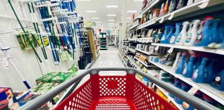 Security Expert STOLE Millions — What He Spent It On Was BIZARRE red shopping cart in a supermarket aisle