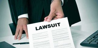 ABSURD $5M CANDY Lawsuit Hits a New LOW Businessperson holding a lawsuit document at a desk