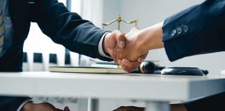 Deputies SOLD Their Badges — And One Did Far WORSE businesspeople handshake with hidden cash exchange under table