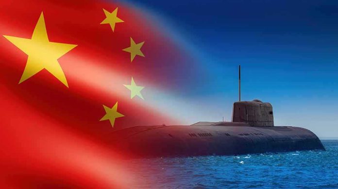 shutterstock_2064350984 Submarine at sea with Chinese flag overlay