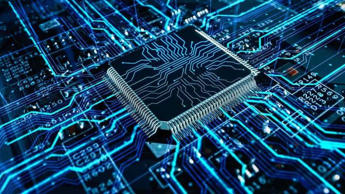 Microchip on a glowing blue circuit board