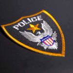 1960 Child Killer Wore A BADGE — Police Had Proof ALL ALONG Police badge patch with eagle emblem on dark background