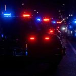 Gunfire Into FAMILIES — And What Police Say Sparked It Police vehicles with flashing red and blue lights at night